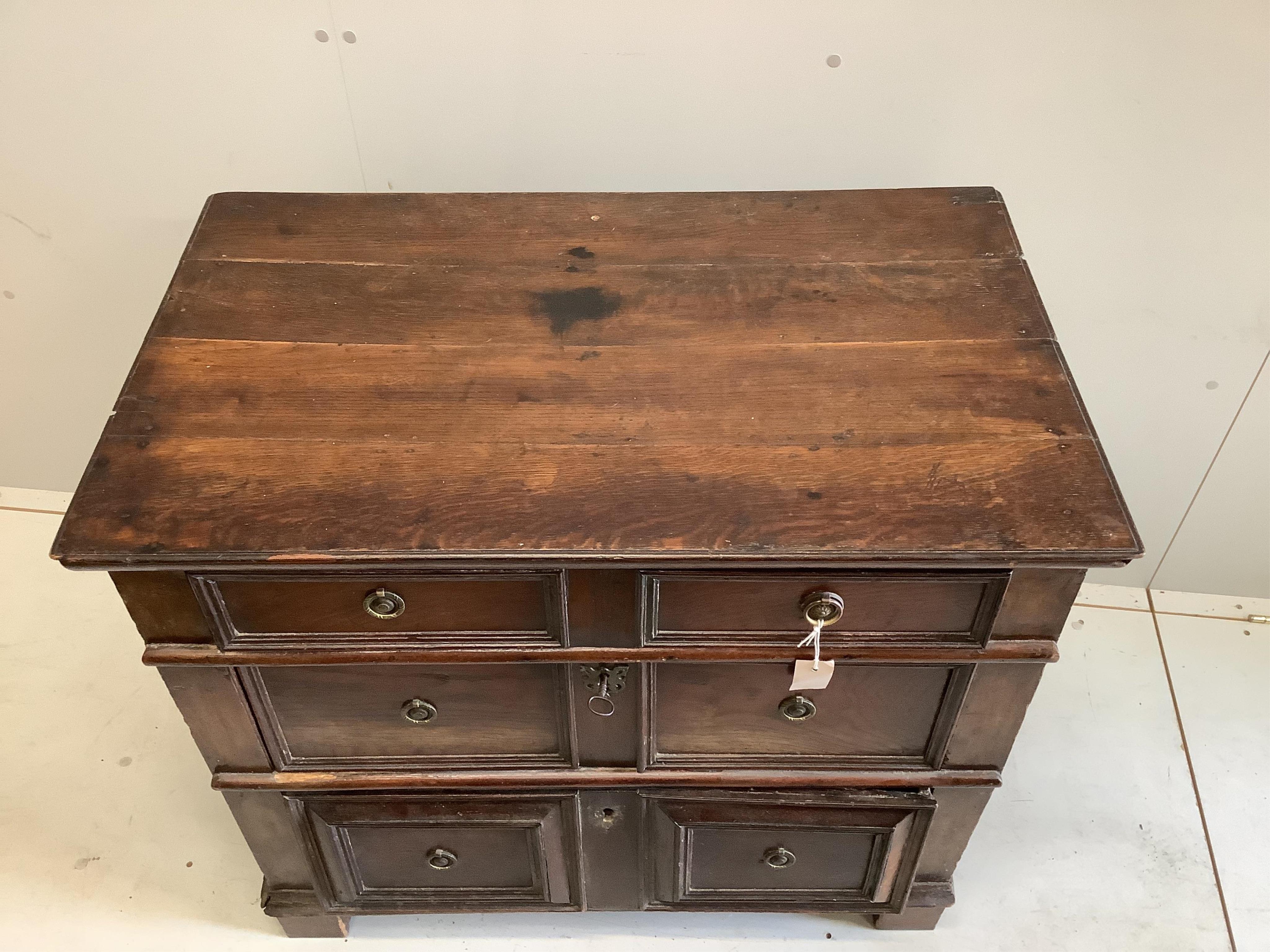 A small 18th century oak three drawer chest, width 89cm, depth 54cm, height 80cm